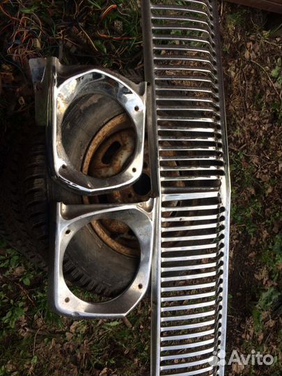 Бампер решетка волга