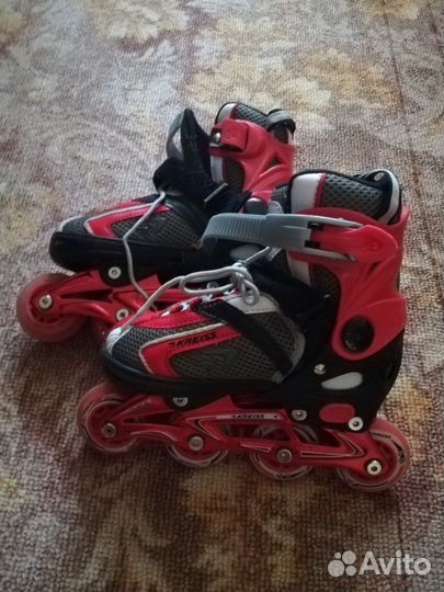 Коньки роликовые