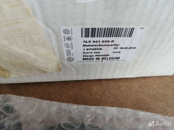 Фара противотуманная левая VW Touareg