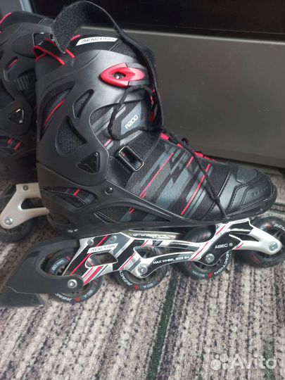 Роликовые коньки