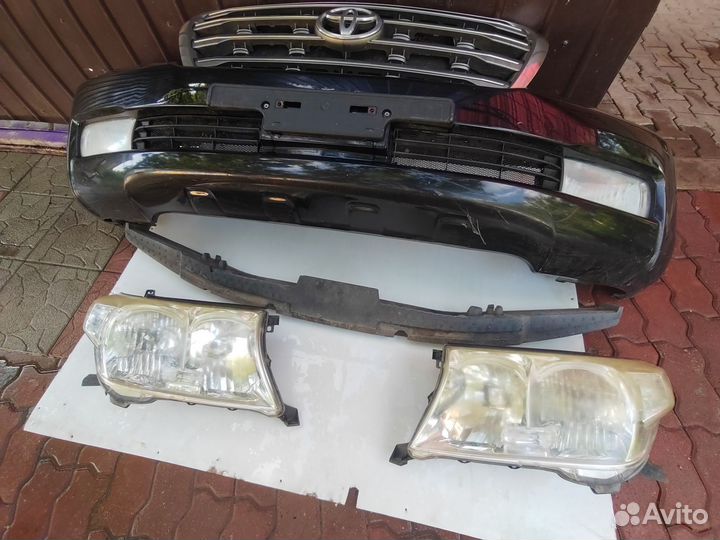 Бампер Toyota Land Cruiser 200 7-12г в сборе целый
