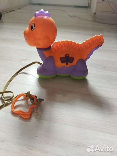 Игрушка каталка на батарейках