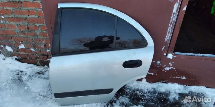 Двери левая сторона almera n16