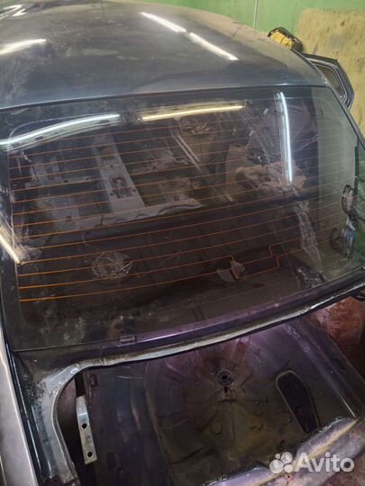 Заднее стекло Renault Logan 1