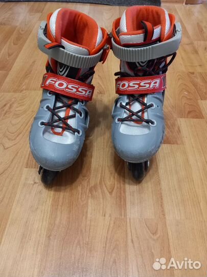 Роликовые коньки