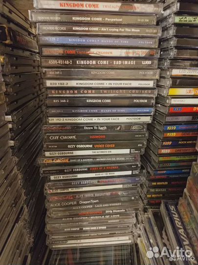 Коллекция CD дисков Beatles, Kiss, Alice Cooper