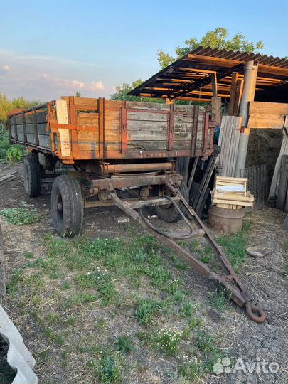 Тракторный прицеп 2птс-4