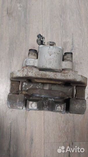 Суппорт тормозной задний правый Bmw X5 3.0D E70