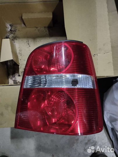 Фонарь правый Touran новый