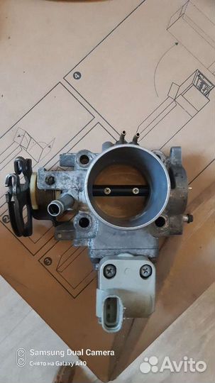 Дроссельная заслонка