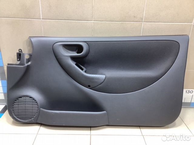 Обшивка двери передняя правая Opel Corsa C