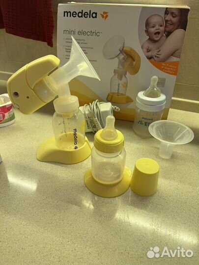 Молокоотсос medela электрический
