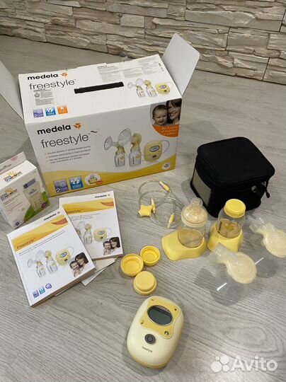 Молокоотсос medela электрический