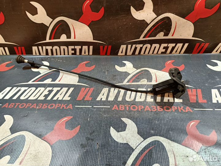 Трос лючка бензобака Opel Astra H