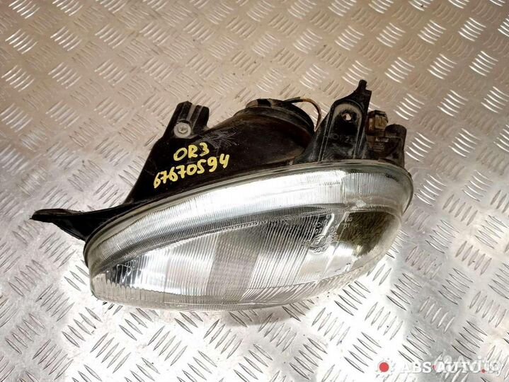 Фара левая Opel Corsa B 2000 E95027