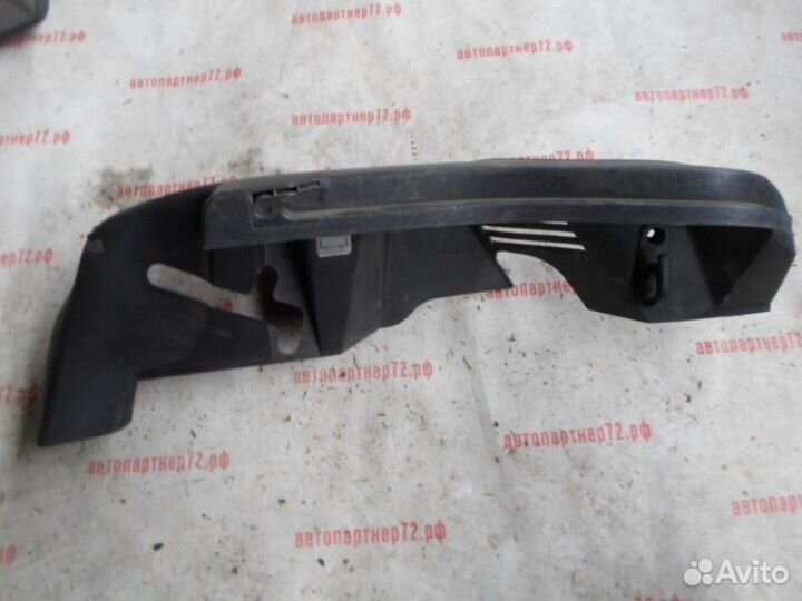 Обшивка багажника правая (держатель полки ) Ford F