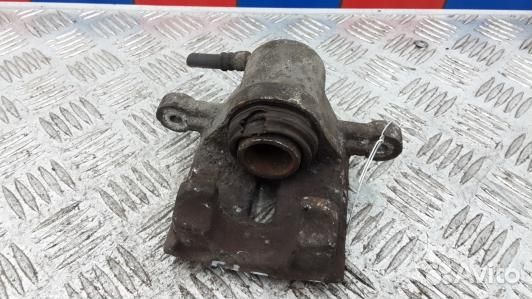 Суппорт тормозной задний правый KIA carens 3 (ZML1