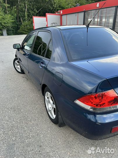 Mitsubishi Lancer 1.6 МТ, 2006, 305 000 км