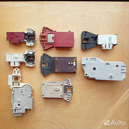 Устройство блокировки люка для стиральных машин