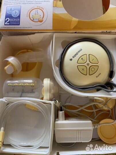 Молокоотсос medela электрический