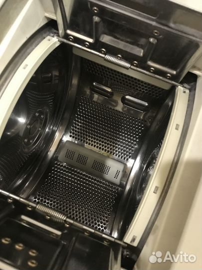 Стиральная машинка с вертикальной загрузкой