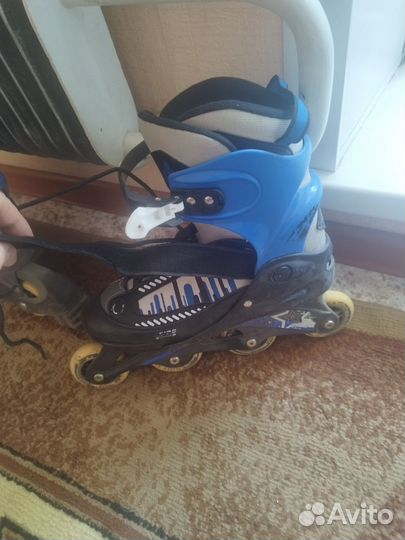 Роликовые коньки