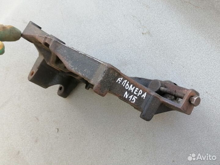 Кронштейн генератора Nissan Almera N15 1995-2000