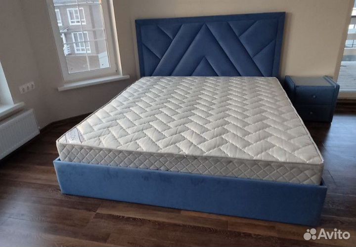 Кровать с подъемным механизмом