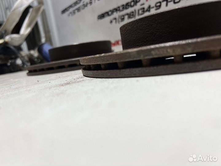 Передний тормозной диск Mazda 323 BG