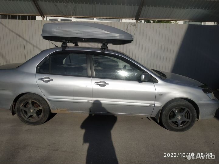 Автобокс (багажник) на Mitsubishi Lancer 9