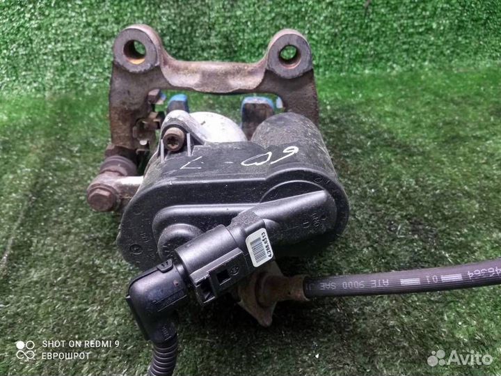 Суппорт задний левый Volkswagen Passat (B6) (2005