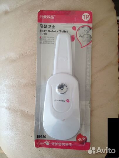 Блокировка крышки унитаза