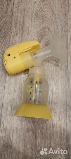 Молокоотсос medela электрический