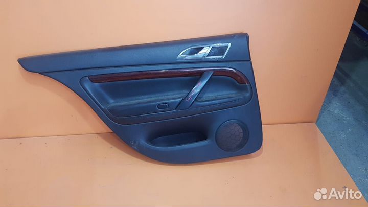 Обшивка задней левой двери на Skoda Superb