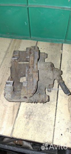 Суппорт тормозной передний правый Chevrolet Lanos