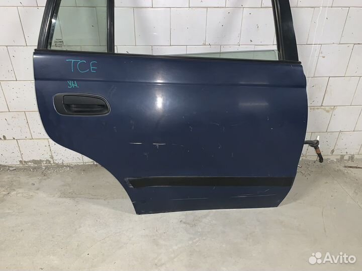 Дверь задняя правая Toyota Carina E универсал