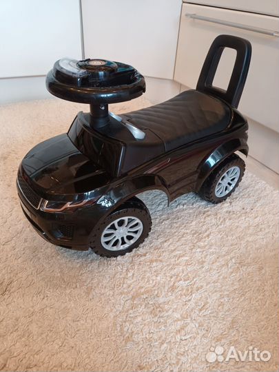 Машинка-каталка со светом и звуком новая