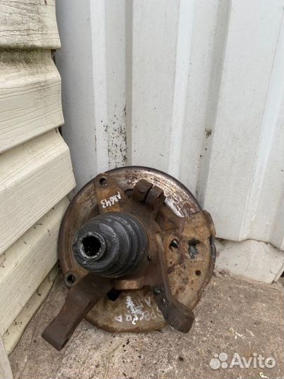 Кулак поворотный передний левый Kia Spectra седан