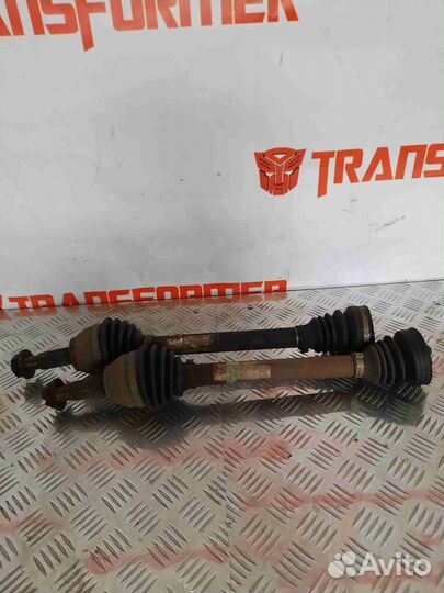 Привод (полуось) левый Ford Focus 1 USA