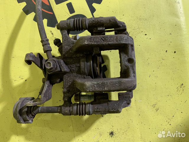 Суппорт задний правый opel astra J. 5D