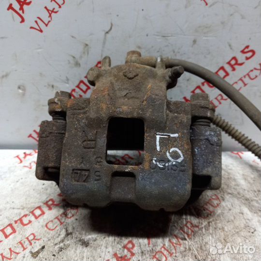 Суппорт тормозной передний Mitsubishi Lancer 9