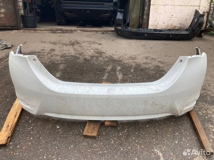Бампер задний Toyota Corolla 180