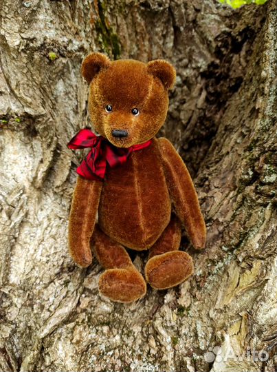 Мишка-тедди с красным бантом