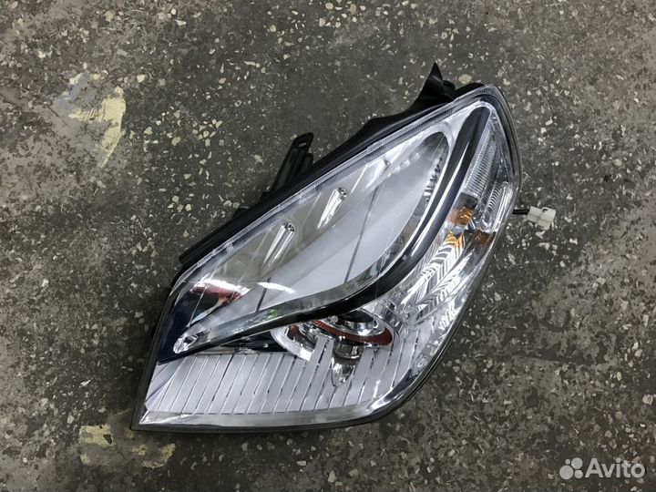 Фара левая новая Geely MK Cross