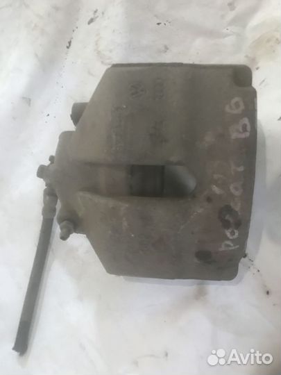 Суппорт тормозной передний правый Passat B6