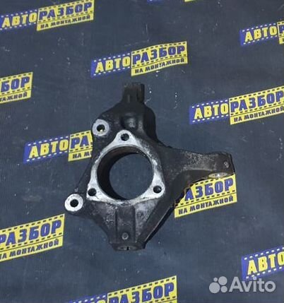 Поворотный кулак левый Опель Астра J