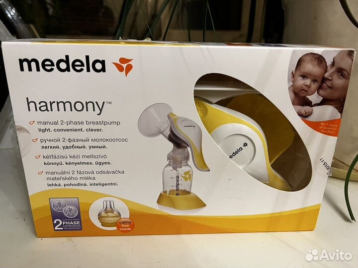 Молокоотсос medela ручной