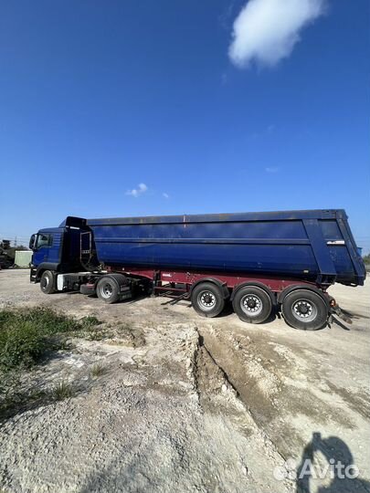 MAN TGS 19.390 с полуприцепом, 2010