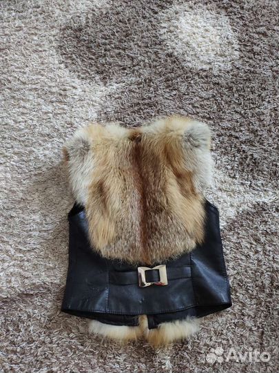 Меховая жилетка