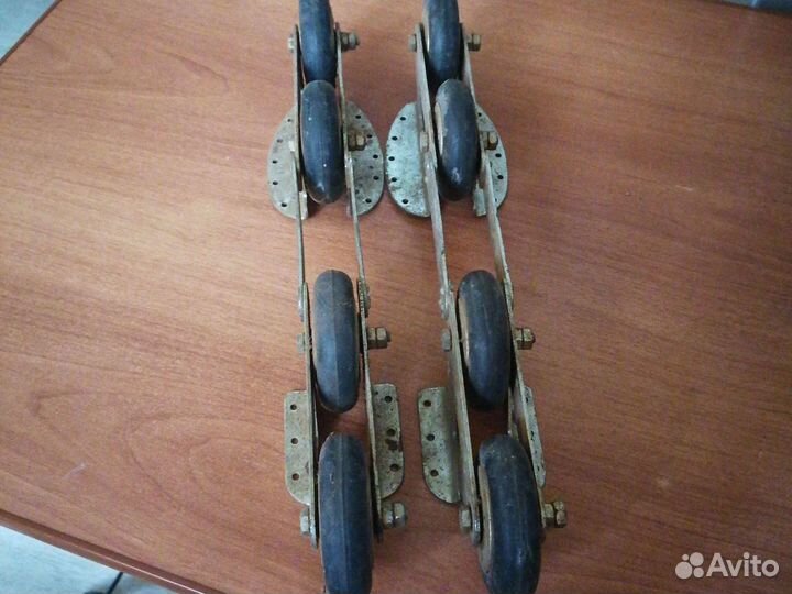 Роликовые коньки